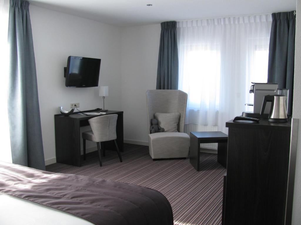 Boutique Hotel De Zwaluw De Koog  Ruang foto
